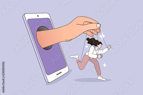 Large hand coming out of mobile phone screen controlling a woman like a puppet representing internet influence technology addiction and lack of freedom in digital world