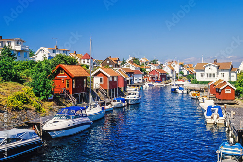 Sea canal with boats at a swedish old fishing village in the summer