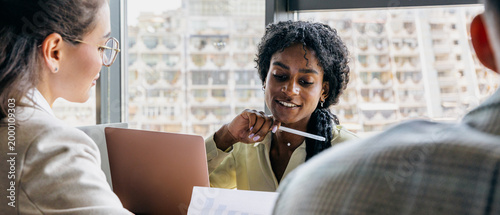 фотографія Determined woman involved in professional contract negotiation session