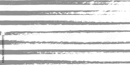 Horizontal gray brush stroke lines with grunge texture on white background for artistic banner design and creative graphic layouts requiring a modern organic feel