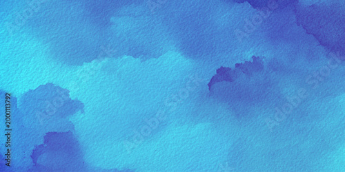 Vibrant blue watercolor background with soft gradient clouds texture