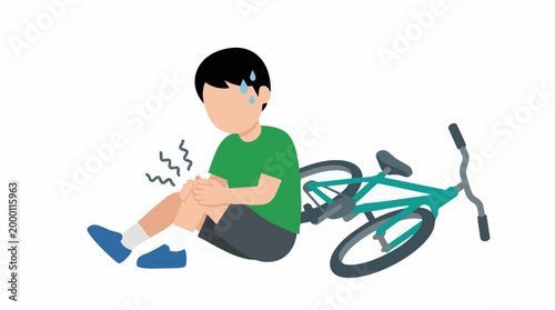 Young boy falls off bicycle, sits on ground holding injured knee in pain