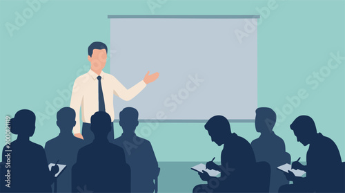 Professional speaker presenting to an audience at a business seminar or training