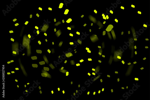 Abstract bokeh light effect vibrant yellow lights on a dark background