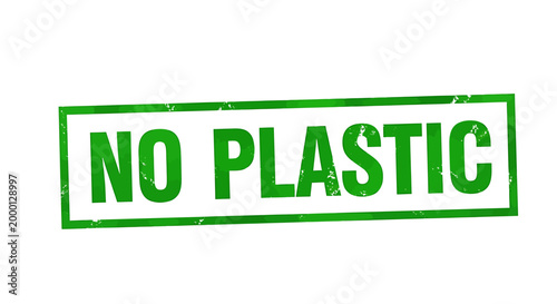 A green rectangular stamp with the words "NO PLASTIC" printed in bold white letters, symbolizing environmental protection and a call to reduce plastic usage.