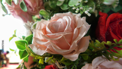 Closeup of artificial flowers decorated on the stage of a ceremonial function