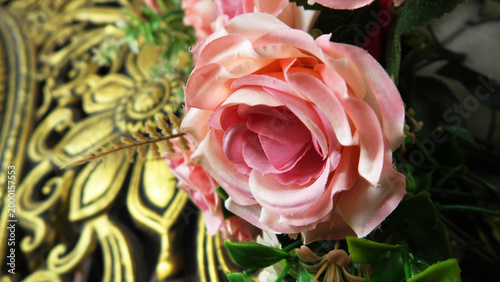 Closeup of artificial flowers decorated on the stage of a ceremonial function