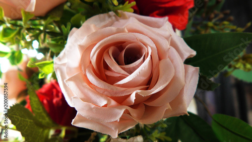 Closeup of artificial flowers decorated on the stage of a ceremonial function