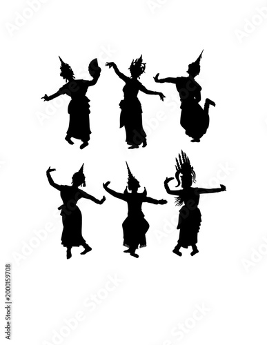 A graceful silhouette of a traditional Thai dancer performing a classical Khon dance