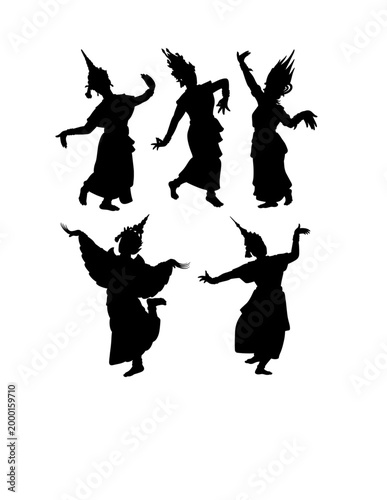 A graceful silhouette of a traditional Thai dancer performing a classical Khon dance