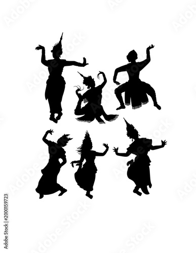 A graceful silhouette of a traditional Thai dancer performing a classical Khon dance