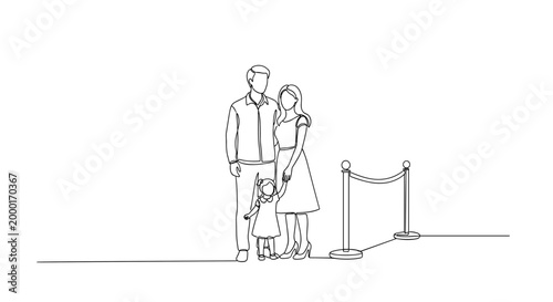 Parents with child waiting in queue at rope barrier background