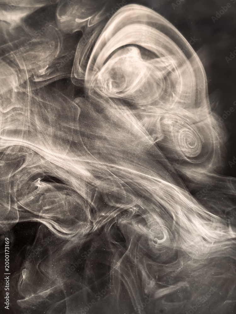 Obraz premium abstract monochrome smoke pattern in the dark on a black background