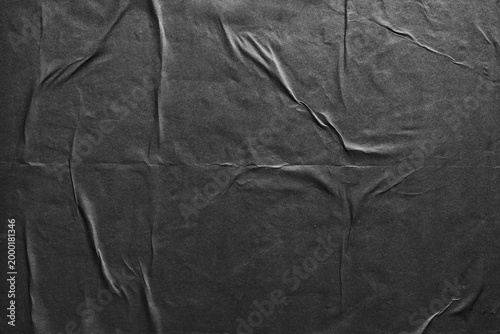 Wrinkled Black Glued Paper Texture Background with Wet Creases