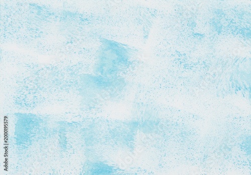 A watercolor background dabbed and smudged with light blue paint using a sponge