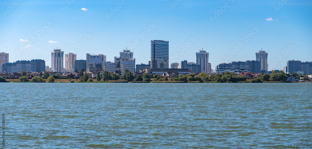 Obraz premium Modern Residential District Lebyazhy in Minsk Belarus by the Water with copy space