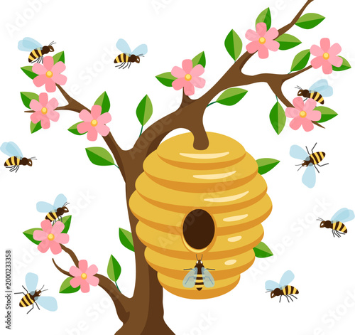 Yellow bee hive hanging on a tree
