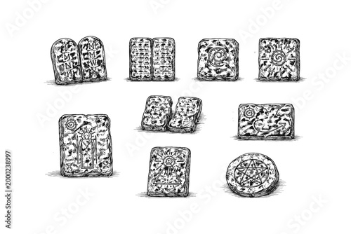 Collection of ancient runes and symbols etched onto stone tablets and discs