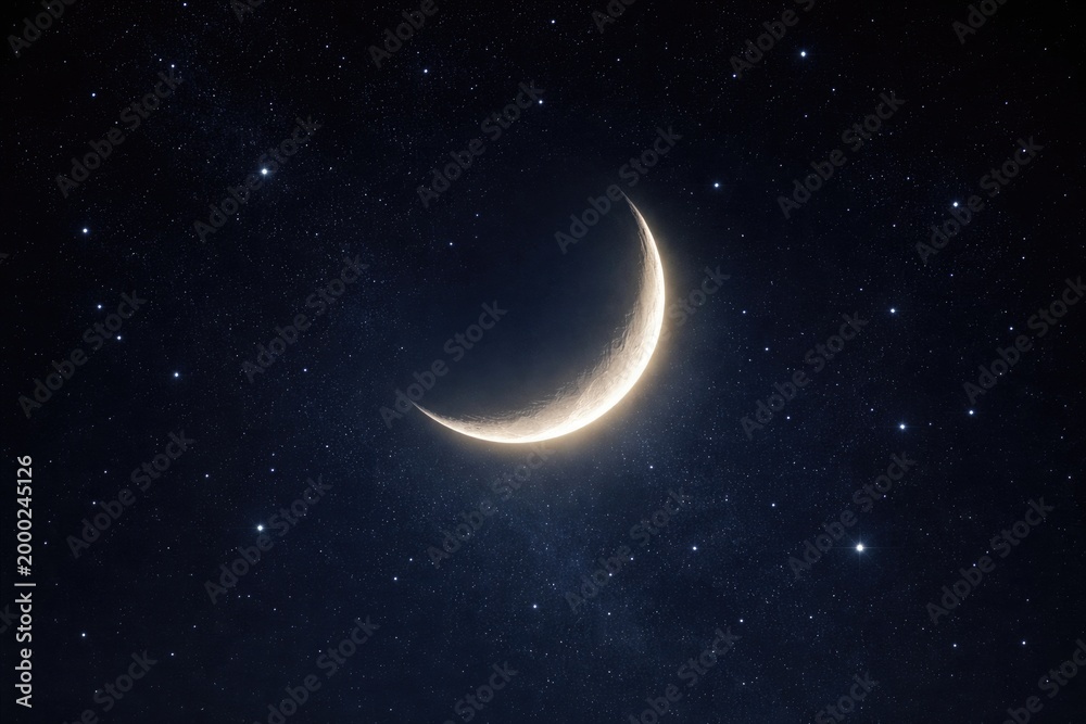 Fototapeta premium Luminous Crescent Moon Against a Dark Clear Sky with Bright Stars