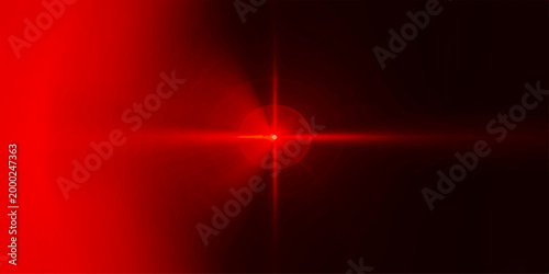 A striking abstract image showcases a vibrant red light against a dark backdrop, creating an intense visual impact. 