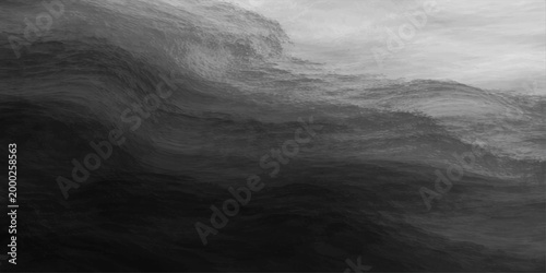 A dark and moody black and white landscape of misty mountains under a stormy sky with clouds reflecting over a deep lake texture