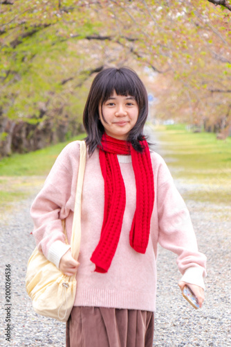 Young Woman Wearing Scarf Outdoors
