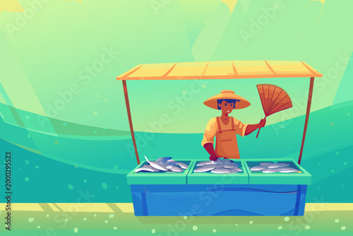 Vendor Using Hand Fan to Keep Flies Away From Fish