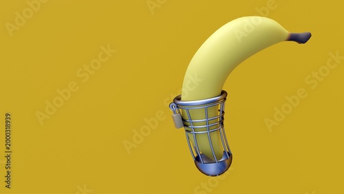 фотографія 3d render of a yellow banana placed and a metal cage-style male chastity device