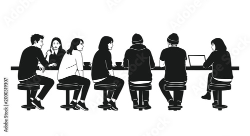 Group of people sitting at counter.