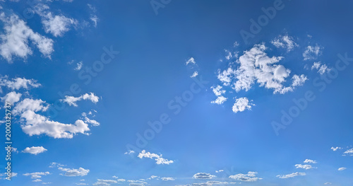 Fotografie A relaxed clouds decomposing in the wind, spreads into a pancake shape