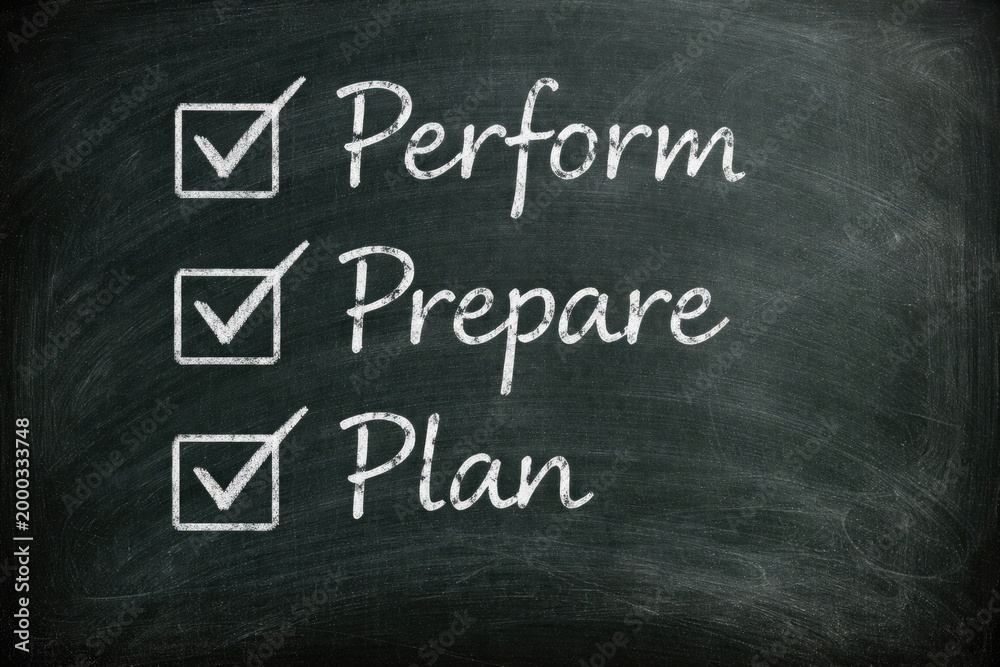 Obraz premium Chalkboard showing perform prepare plan handwritten with check marks