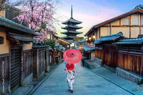 Asian woman wearing japanese traditional kimono at Yasaka Pagoda and Sannen Zaka Street in Kyoto, Japan.