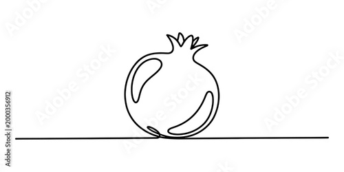 Continuous single line drawing of a fresh pomegranate fruit