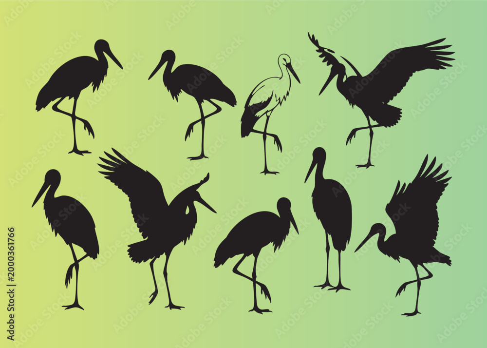 Fototapeta premium Collection of stylized stork silhouettes in various poses and movements isolated illustration