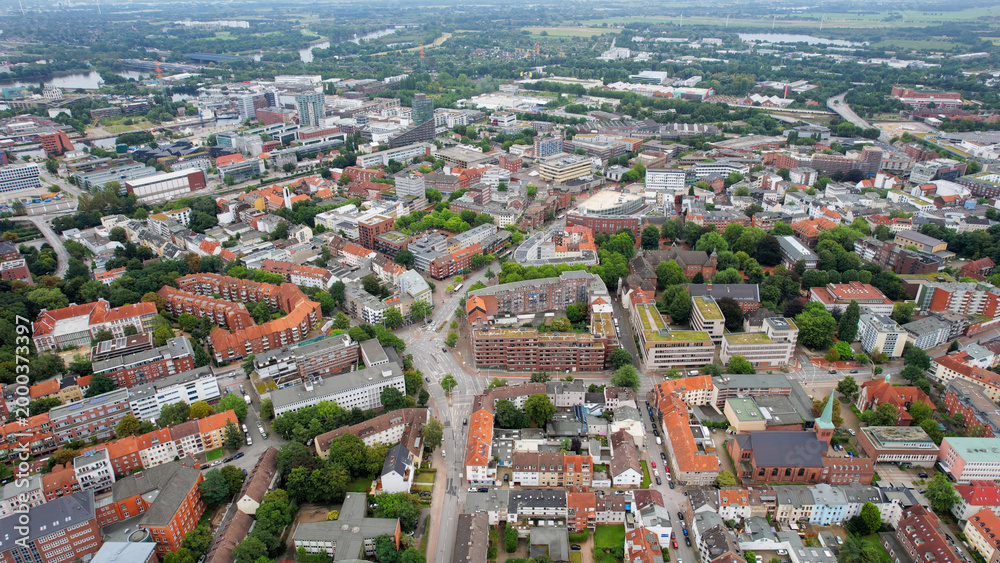 Fototapeta premium Aerial view around the old town of the city Harburg bei Hamburg in north Germany on a sunny spring noon