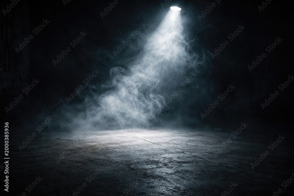 Fototapeta premium Dimly lit room featuring rough concrete floor and white smoke spotlight effect