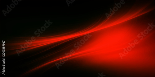 An abstract display of luminous red energy gracefully dances across a dark space, evoking a feeling of mystery and excitement. 
