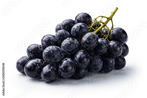Isolated fresh black grape ...