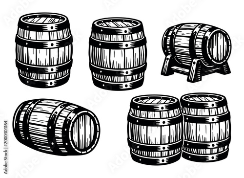 Wooden barrels set in different positions and sizes on a white background, useful for beverage industry concepts