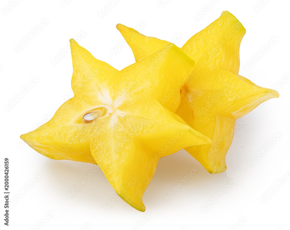 Fototapeta premium Two slices of star fruit or carambola isolated on white background with clipping path.