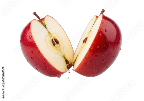 Freshly halved red apple revealing juicy core