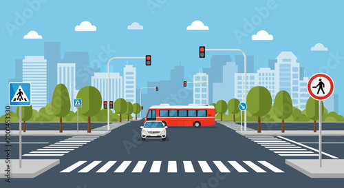 City street with crosswalks, traffic lights, car, bus, and pedestrian signs