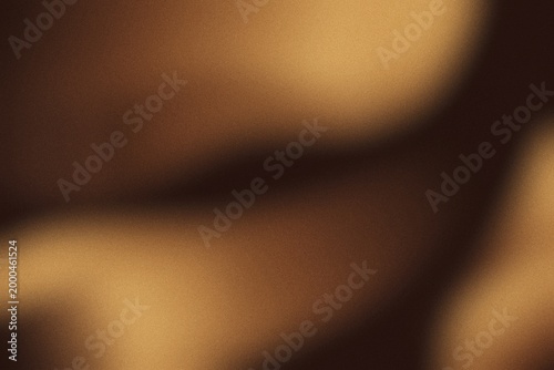 Abstract background with soft blurred shapes and textured grainy photographic noise.