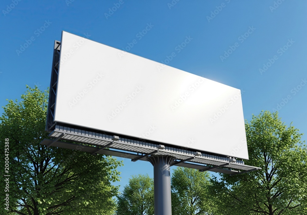 Fototapeta premium Blank billboard sign in the daytime with blue sky and green trees