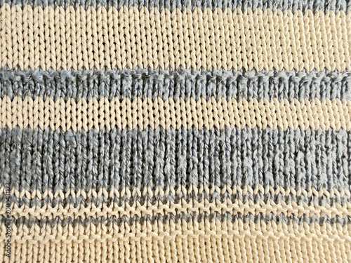 texture of natural cotton and wool striped knit fabric for sustainable textile design and slow fashion aesthetic
