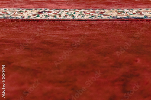 Selected focus photo of the surface of the muslim prayer mat with the Repetition Pattern.