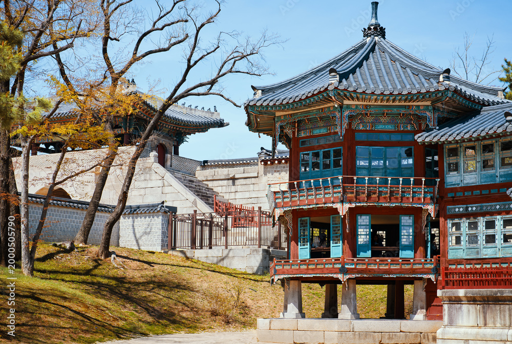 Fototapeta premium Pavilion Parujeong of Jibokjae Private Royal Library at Gyeongbokgung Palace in Seoul, South Korea. Beautiful building of traditional Korean architecture.