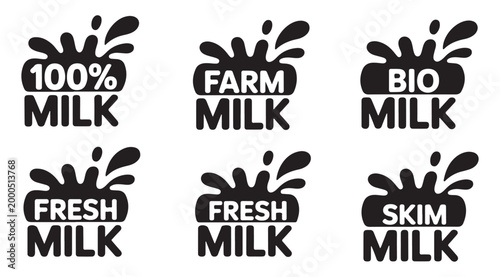 Set of black milk product labels with splash design and bold text isolated on white surface.