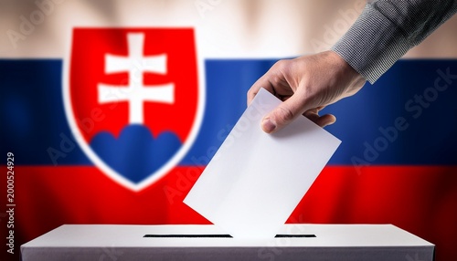 a hand put a paper in a voting box; blurred Slovakia flag background; dark atmosphere