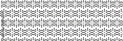 Geometric floral pattern seamless: A continuous ornamental monochrome pattern composed of intricate floral and star-like elements, creating a captivating design.
